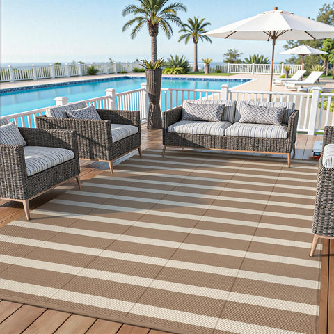 Vaukki beach-ready patio mat by the pool, resilient for high-traffic areas.