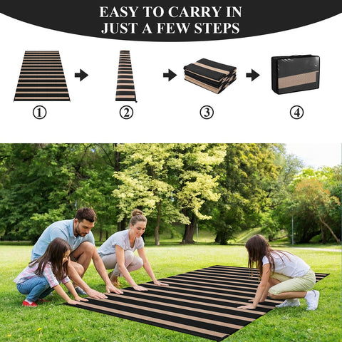 Vaukki outdoor rug with four stakes keeps it secure.