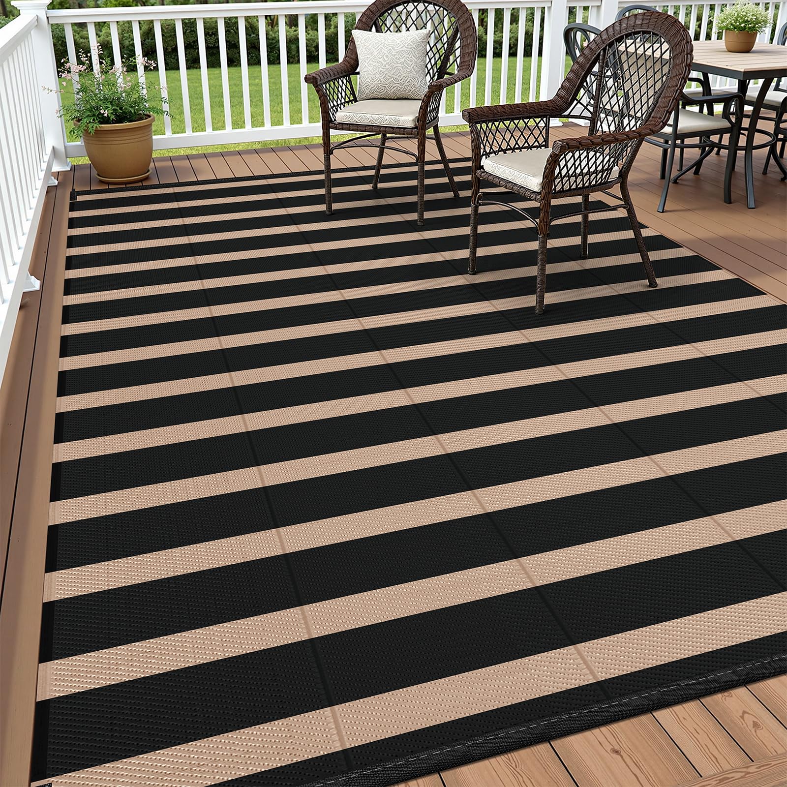 Vaukki waterproof outdoor rug with striped pattern, ideal for patios and RV trips.