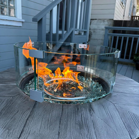 Vchin six-inch glass panel blocks wind for steady flames.