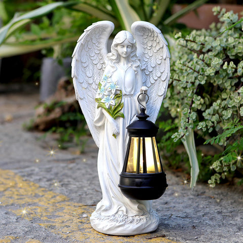 VChymm Solar Angel statue front view lights up your garden at night.
