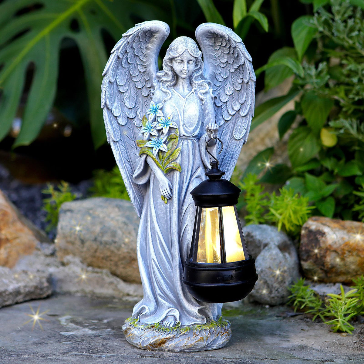 VChymm Solar Angel outdoor statue glows at night, adding whimsical charm to your garden.