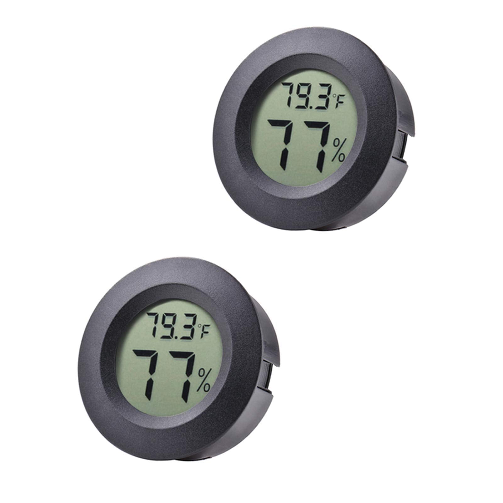 Veanic round hygrometer displays temperature and humidity for precise room monitoring.