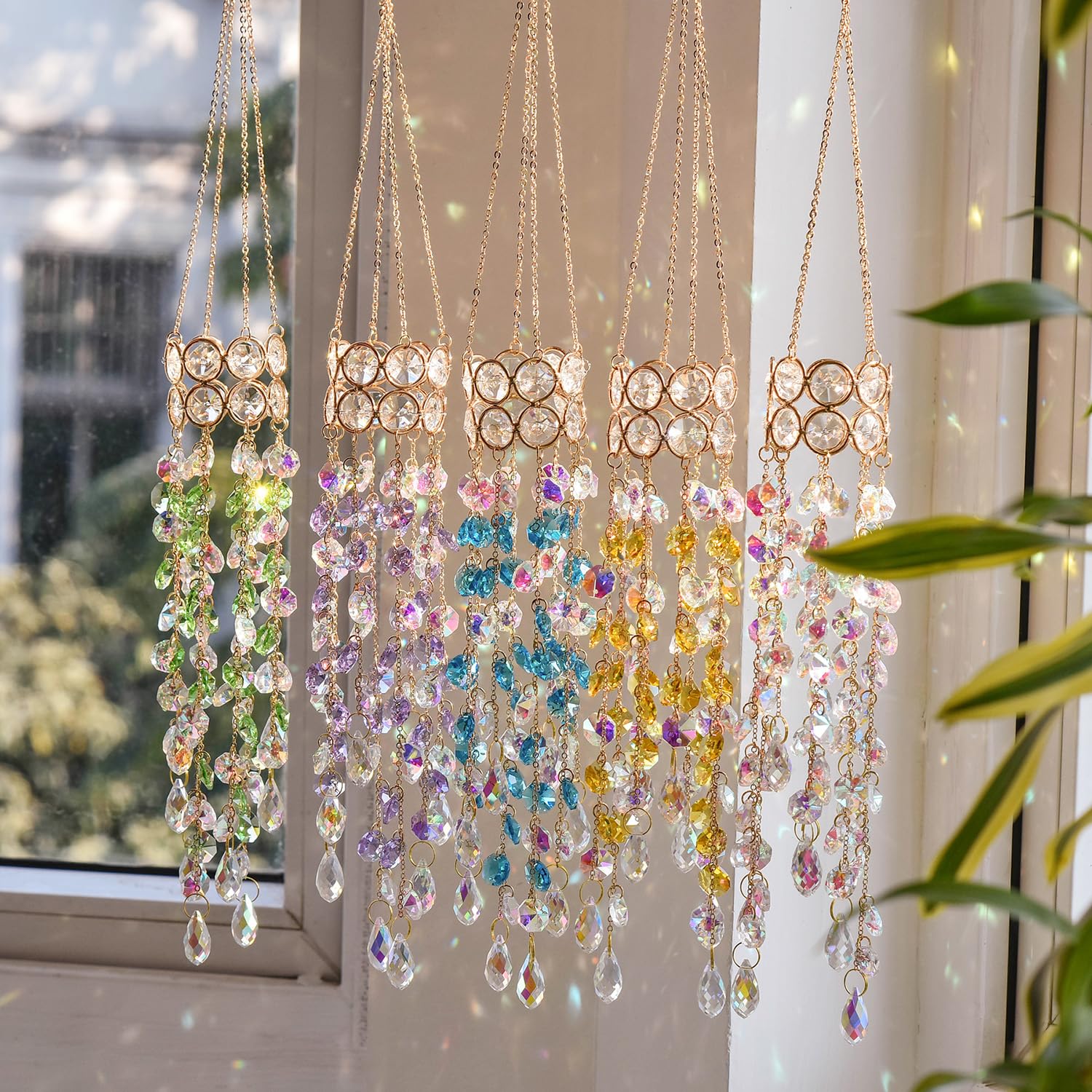 Venusorn crystal sun catcher aurora green creates outdoor charm in sunlight