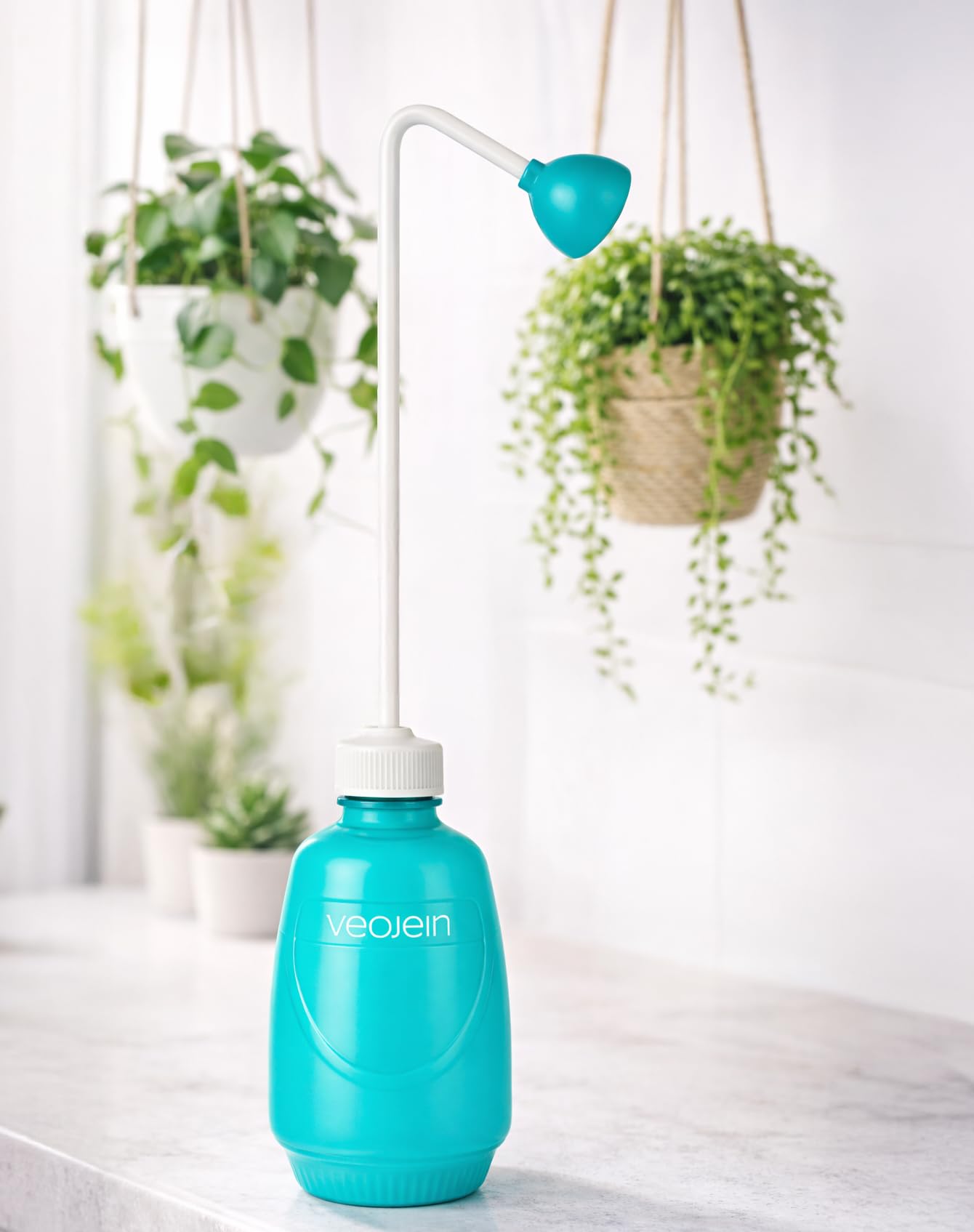 VEOJEIN durable plastic watering bottle built for daily use