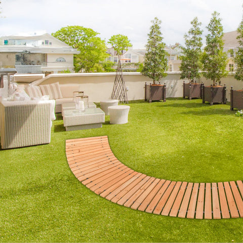 VEVOR cedar boardwalk near patio with guests illustrating event suitability.