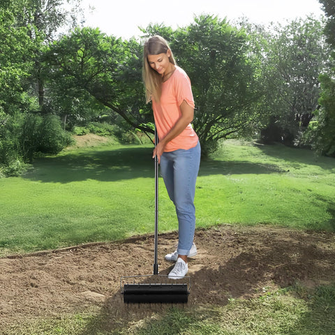 VEVOR lawn aerator in use across a thriving garden