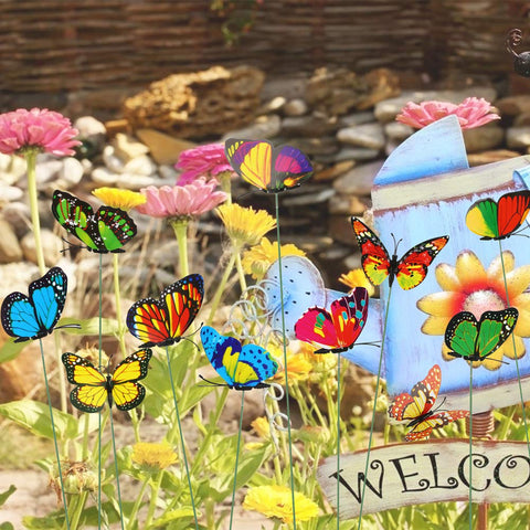 VGOODALL butterfly stakes along a lawn for playful outdoor decor.