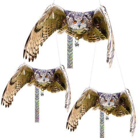 Vicsiyi double-sided owl deterrent hanging in a garden deters birds from feeding areas.