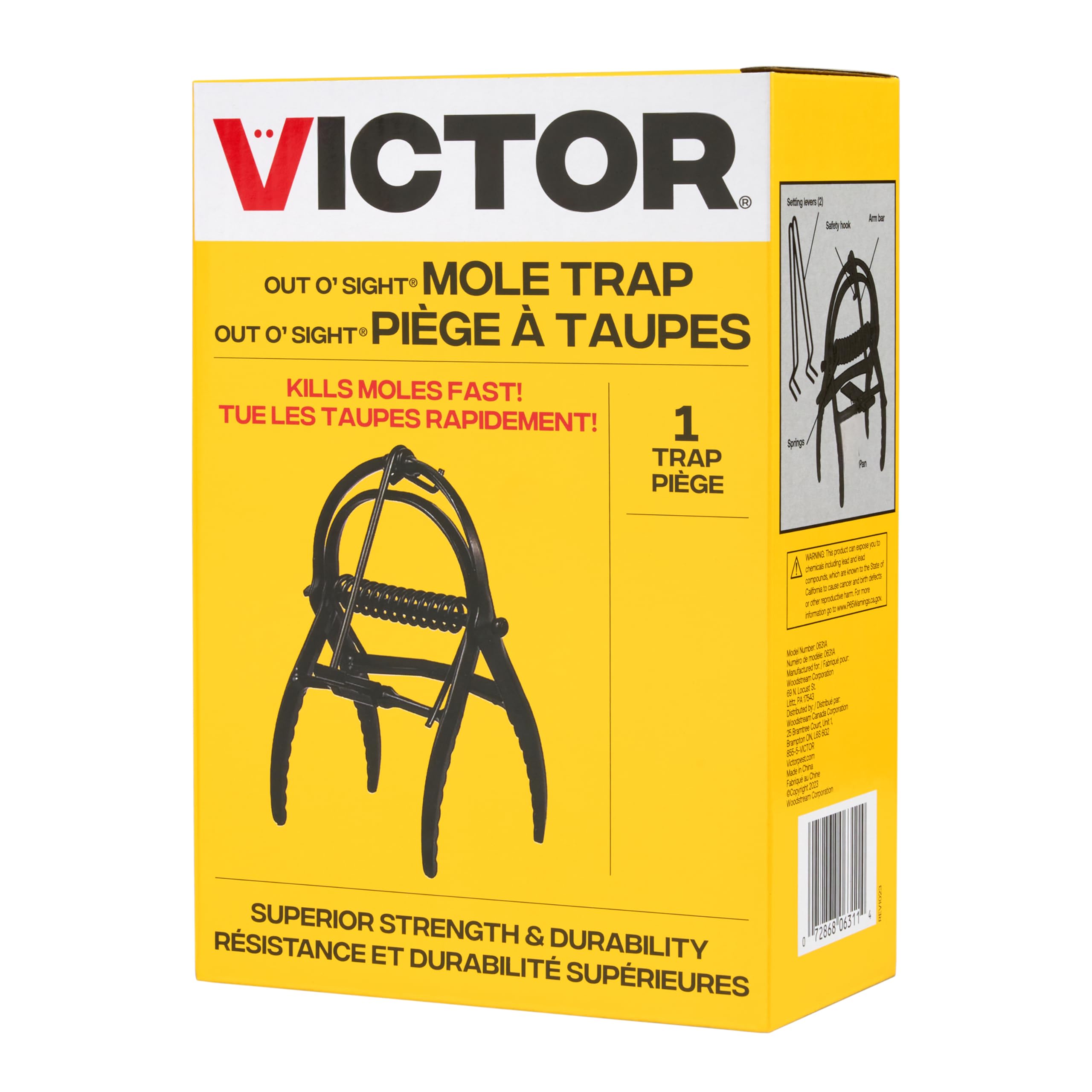 Victor Out O'Sight trap in the field defending a lawn.
