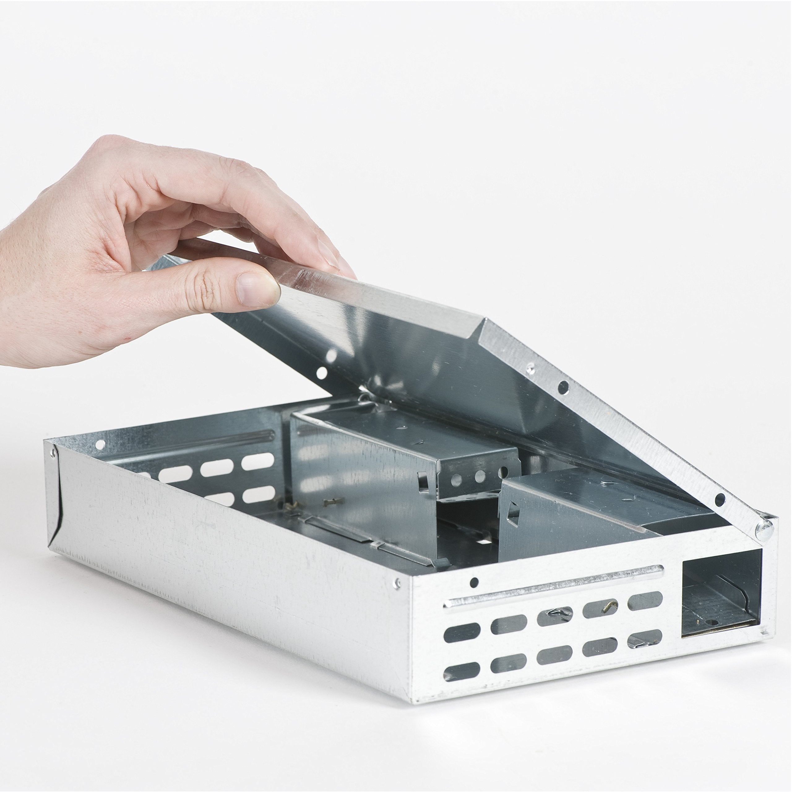 Victor Tin Cat trap showing lid-release feature after capture
