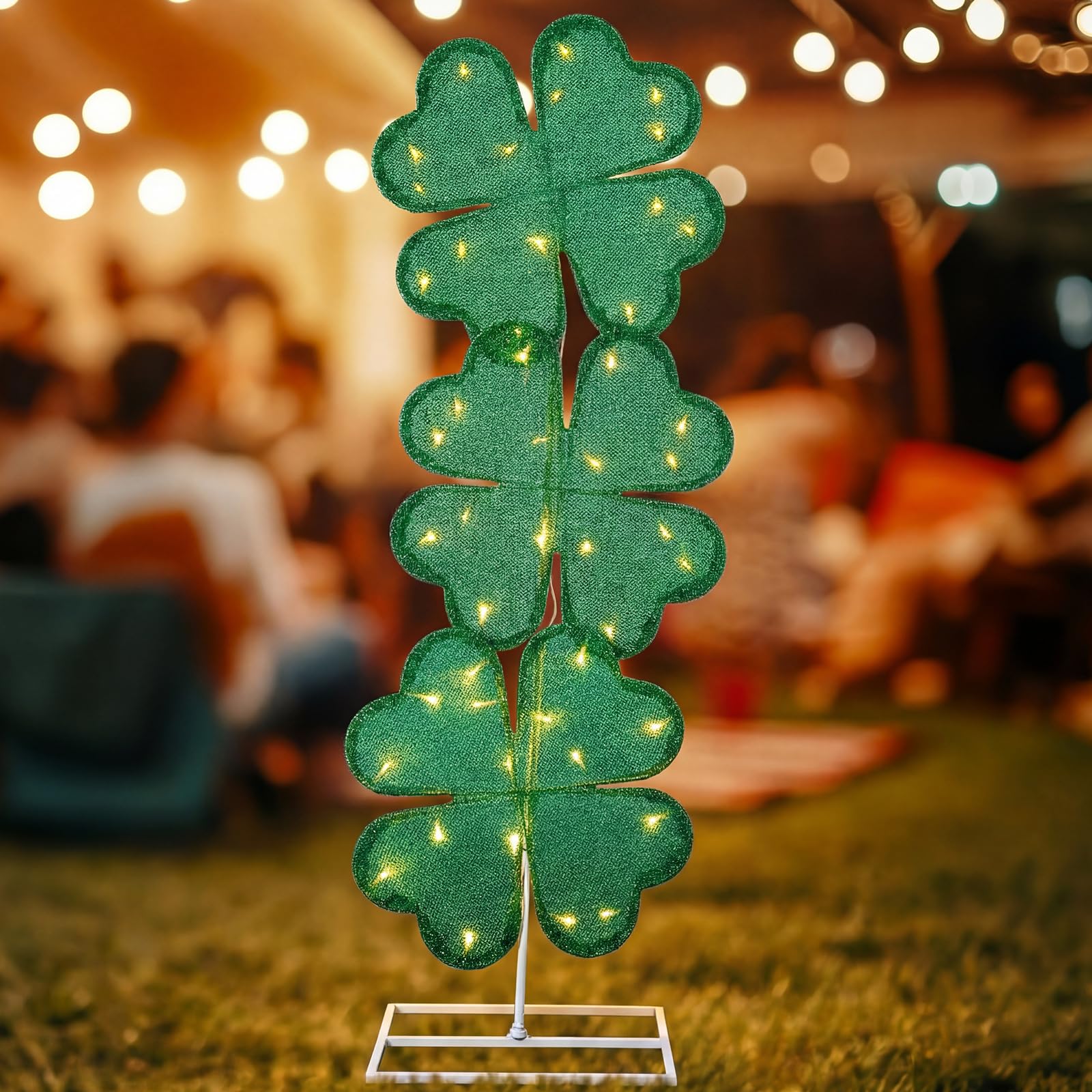 VIHOSE shamrock lights highlight the stacked four-leaf clover design at dusk.