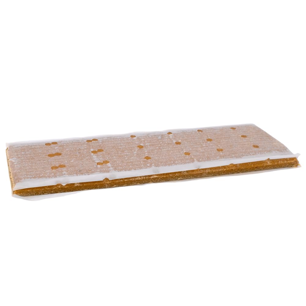 Village Gift Importers pollen patty on hive frame supports brood nutrition