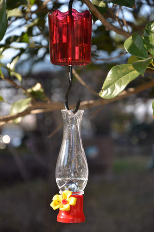 VIMOA mini hummingbird feeder made from premium plastic for outdoor durability.