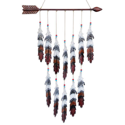 VinSees metal arrow and feather wall art adds vibrant color to any space.