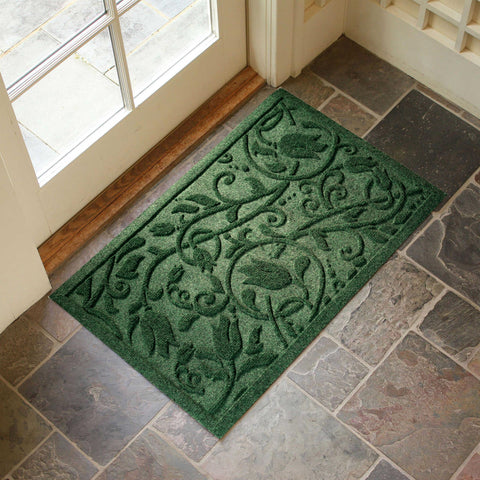 VivaNest Boho Green Floral Leaves dirt-trap grooves help keep floors cleaner.
