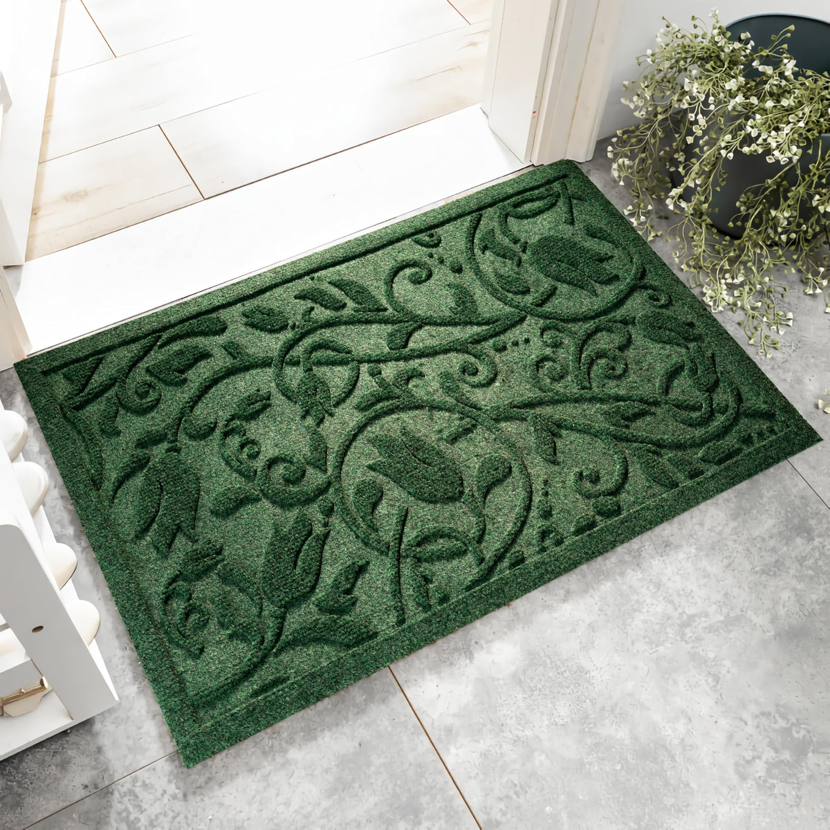 VivaNest Boho Green Floral Leaves front door mat captures dirt and welcomes guests.