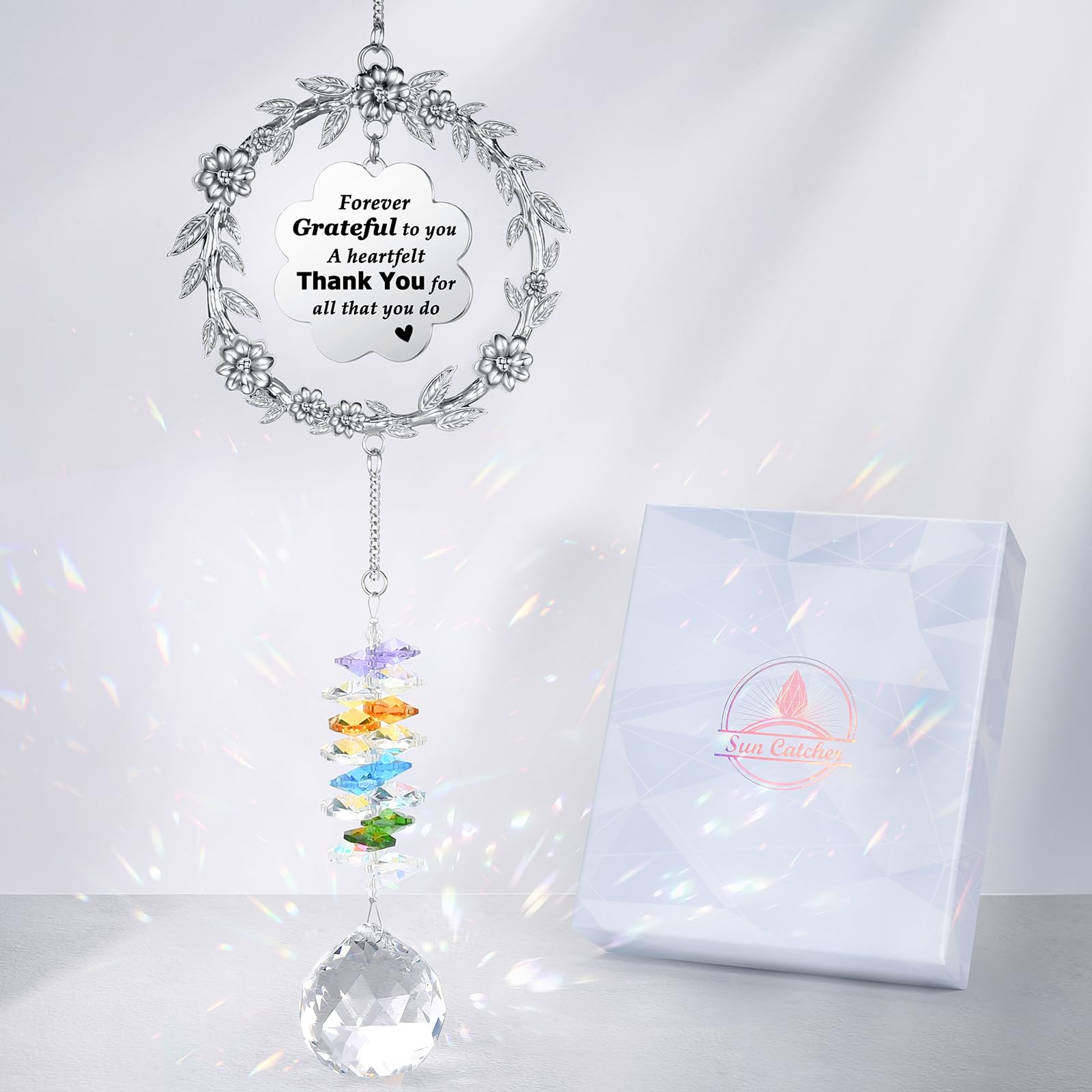 VIVIKEN Thank You Sun Catcher with crystal prisms casting rainbow light.