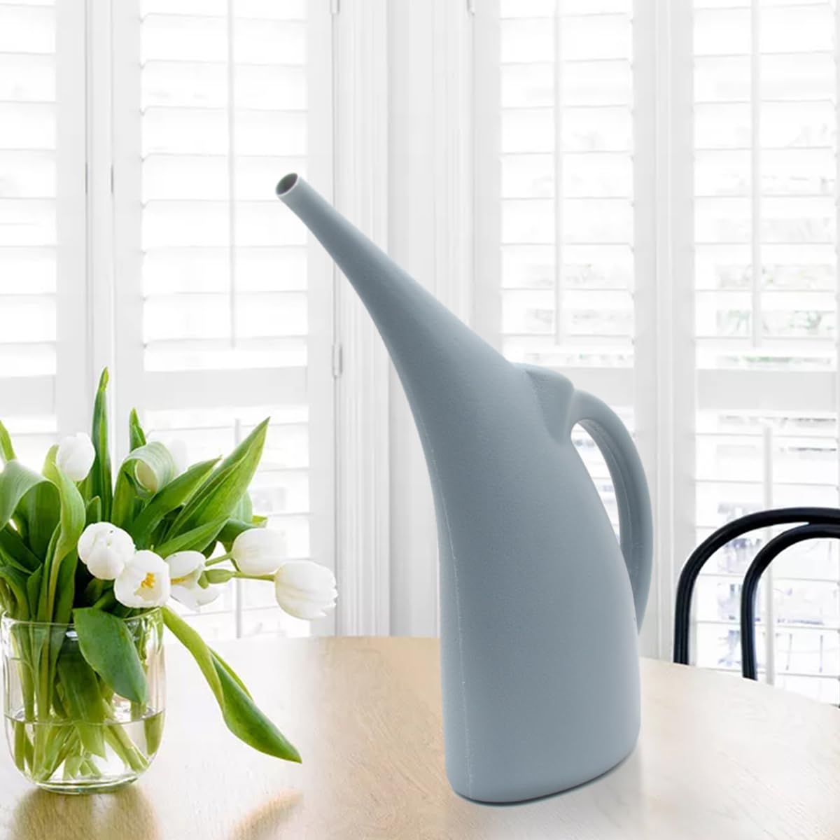 VKPLITE watering can promotes easy grip and steady pours for potted plants.