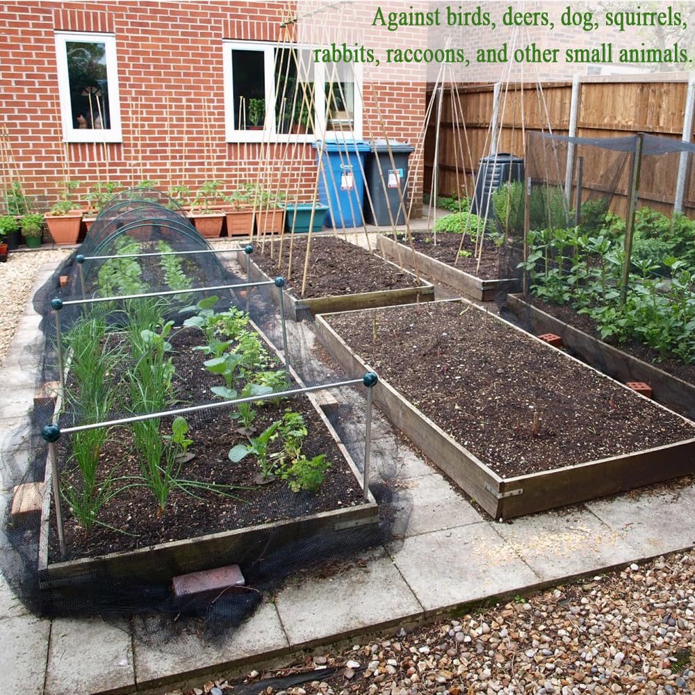 Vocray garden netting secured with stones and stakes for quick setup