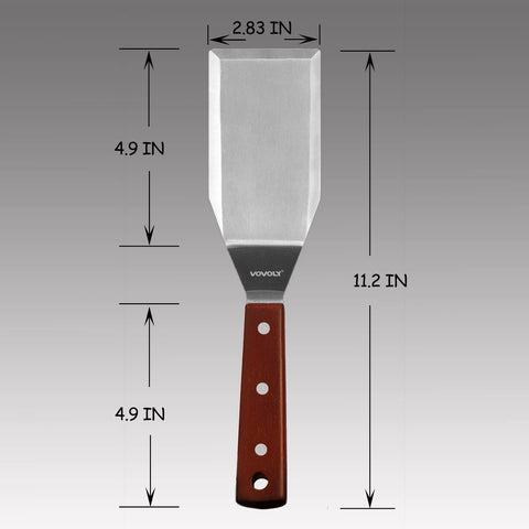 Vovoly spatula on a flat-top grill for versatile cooking