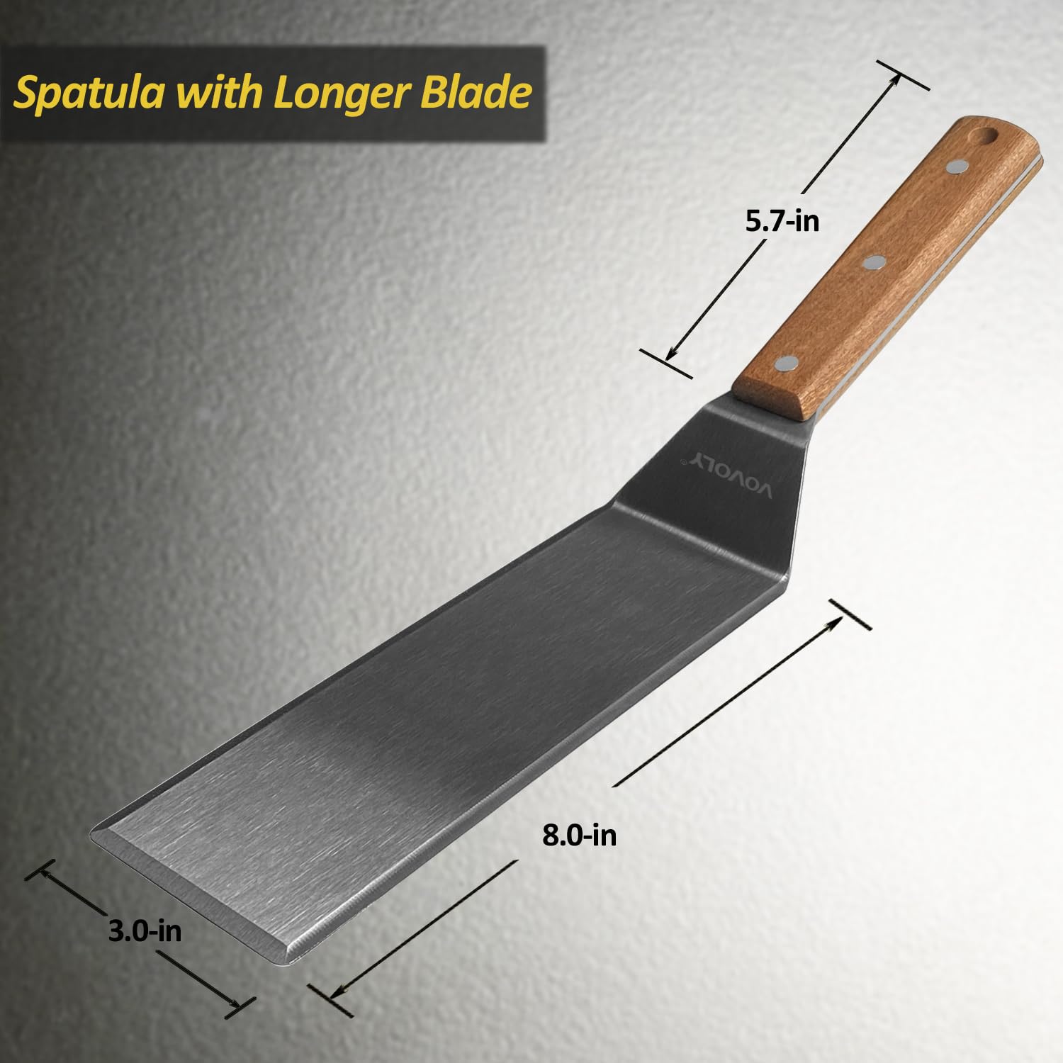 Vovoly wooden-handle griddle spatula shown in side grip.