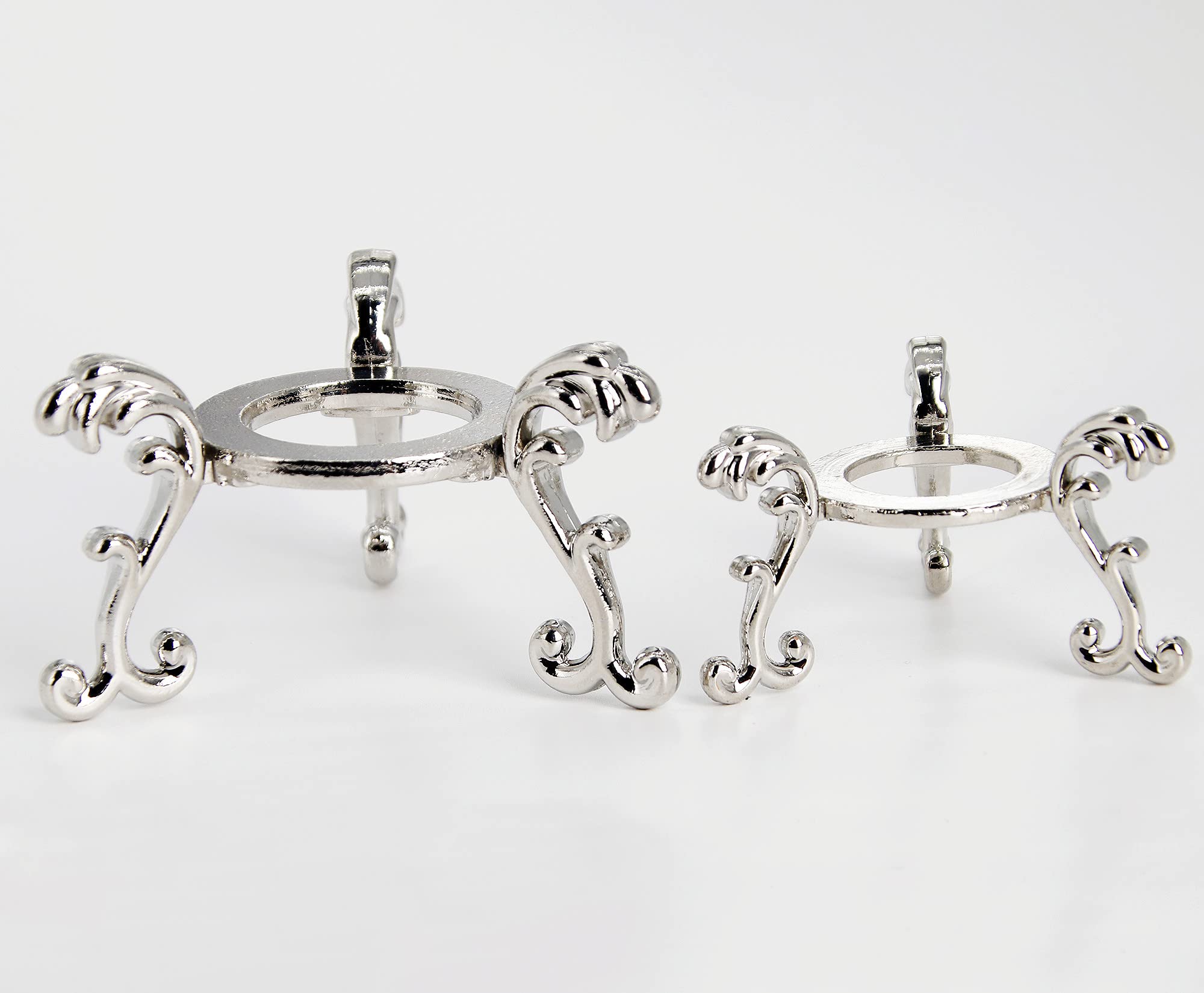 vskikris silver-plated stand for larger crystal balls on a shelf.