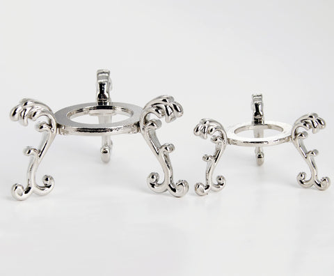 vskikris silver-plated stand for larger crystal balls on a shelf.
