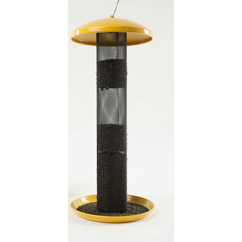 Tiny Nyjer seeds pass through small feeder holes for finches
