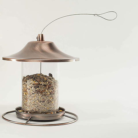 Wagner's 22056 bag beside feeder promises deck-friendly, shell-free feeding