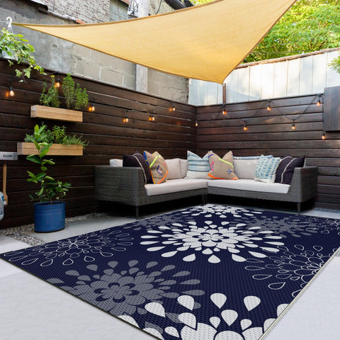 Wallona outdoor rug with a flower design, double‑sided versatility for patios and porches.