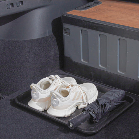 Wataniya Pet raised-edge tray prevents spills from boots and groceries.