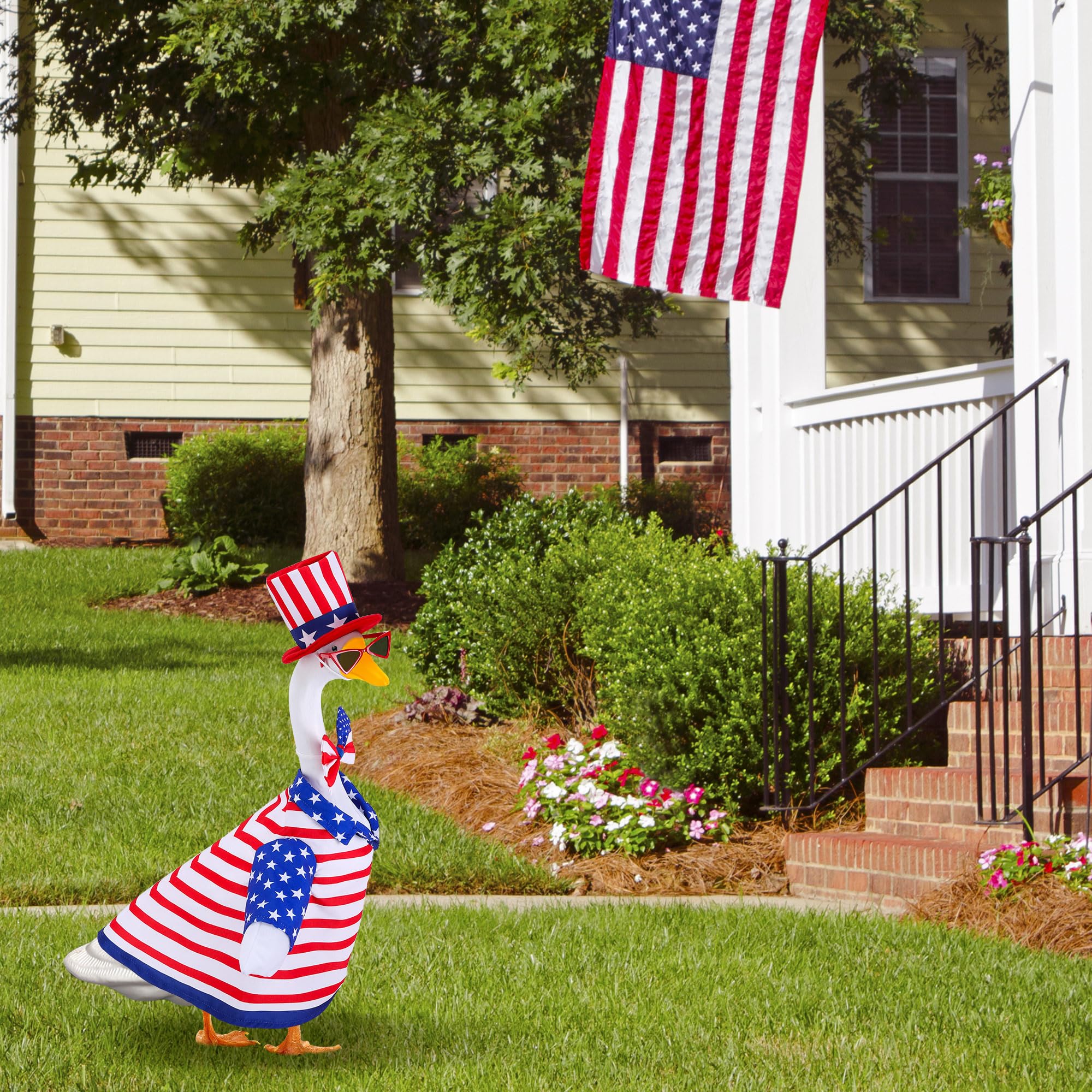 Watayo 23-inch goose statue wearing the outfit during display.