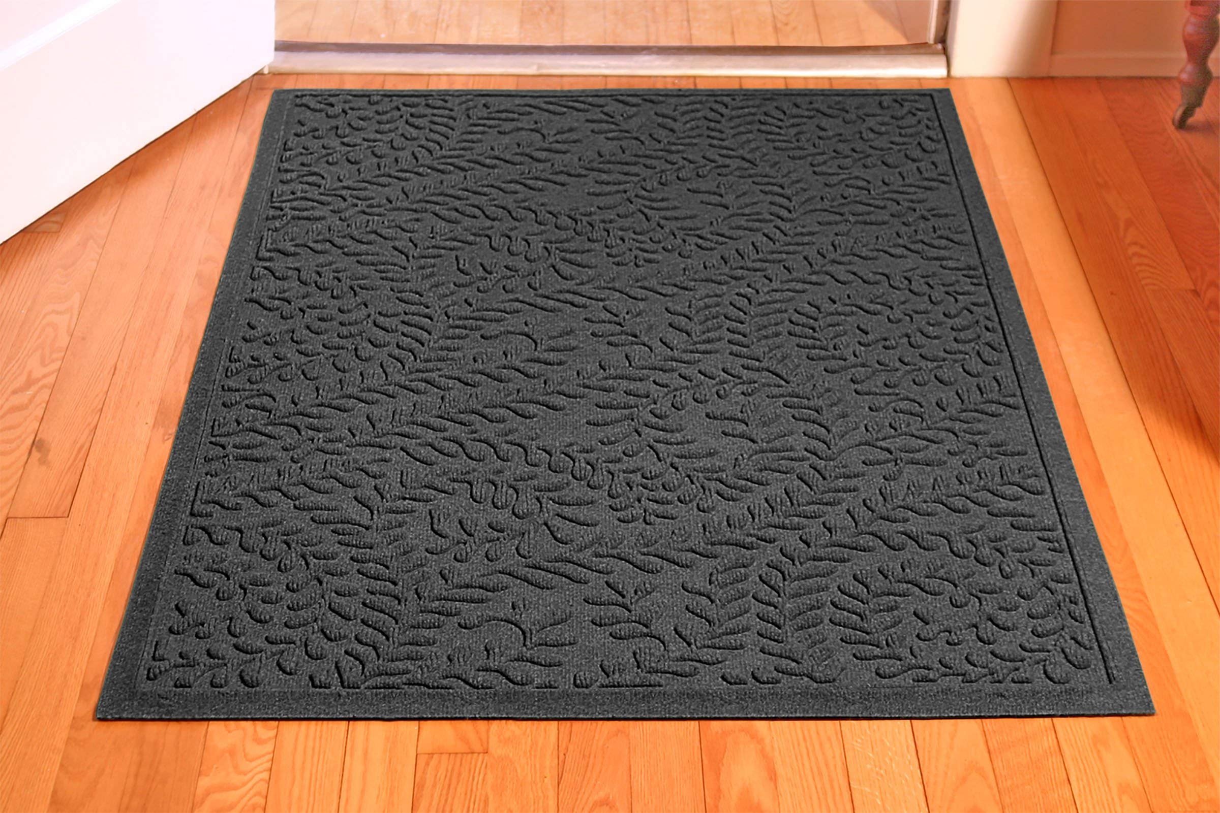 WaterHog Boxwood mat demonstrates water trapping capability for rain and mud