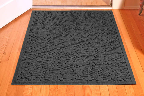 WaterHog Boxwood mat demonstrates water trapping capability for rain and mud