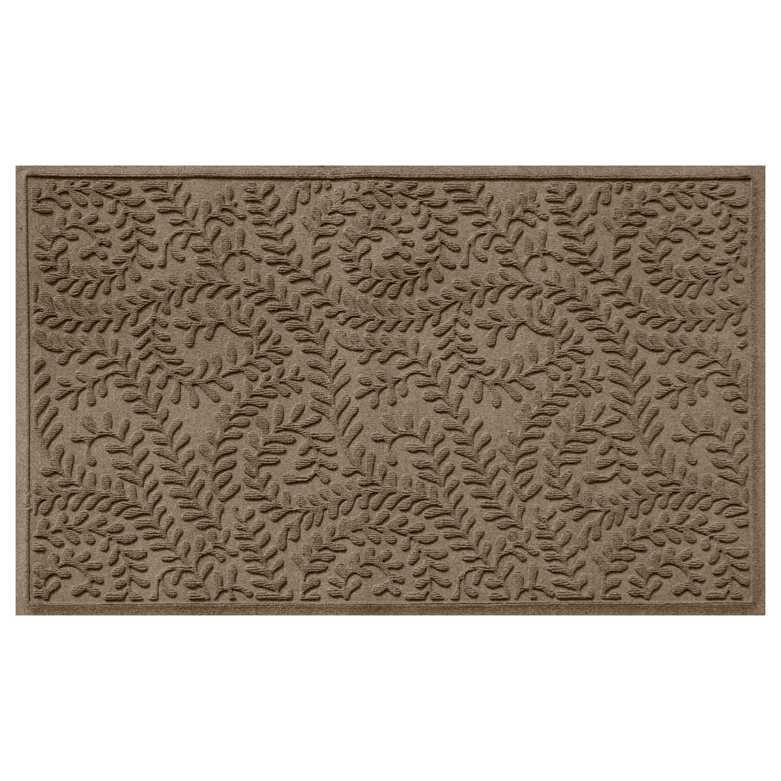 WaterHog Boxwood front door mat close-up showing ribbed texture trapping moisture.