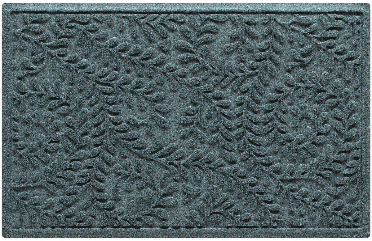 WaterHog Boxwood Front Door Mat ridge design close-up captures dirt at the threshold