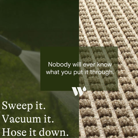 WaterHog Squares all-weather mat withstands rain and mud at busy doors.