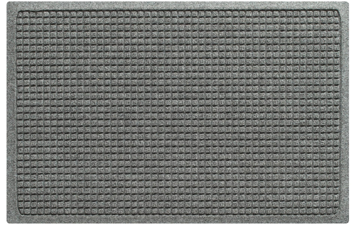 WaterHog Squares front door mat close-up shows absorbent fibers trapping moisture