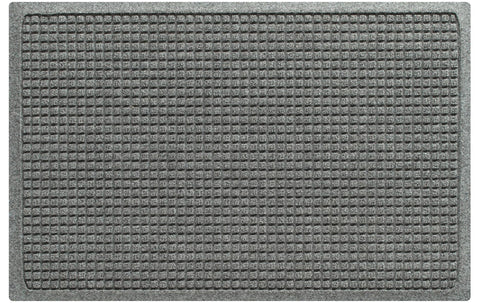 WaterHog Squares front door mat close-up shows absorbent fibers trapping moisture