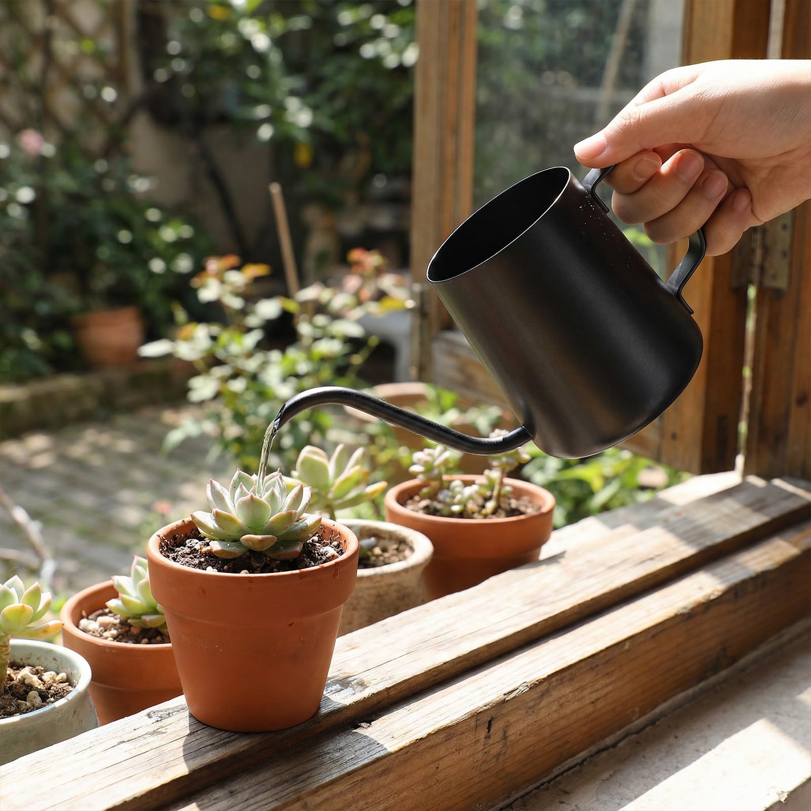 WATMTIN ergonomic-handle mini watering can offers comfortable grip