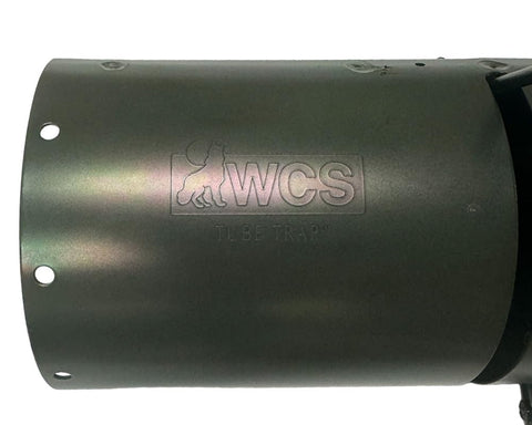 WCS Tube Trap in-use image shows baited setup for attracting squirrels near feeders.