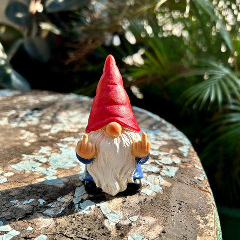 Middle Finger Gnome features weather-resistant poly resin for lasting display.