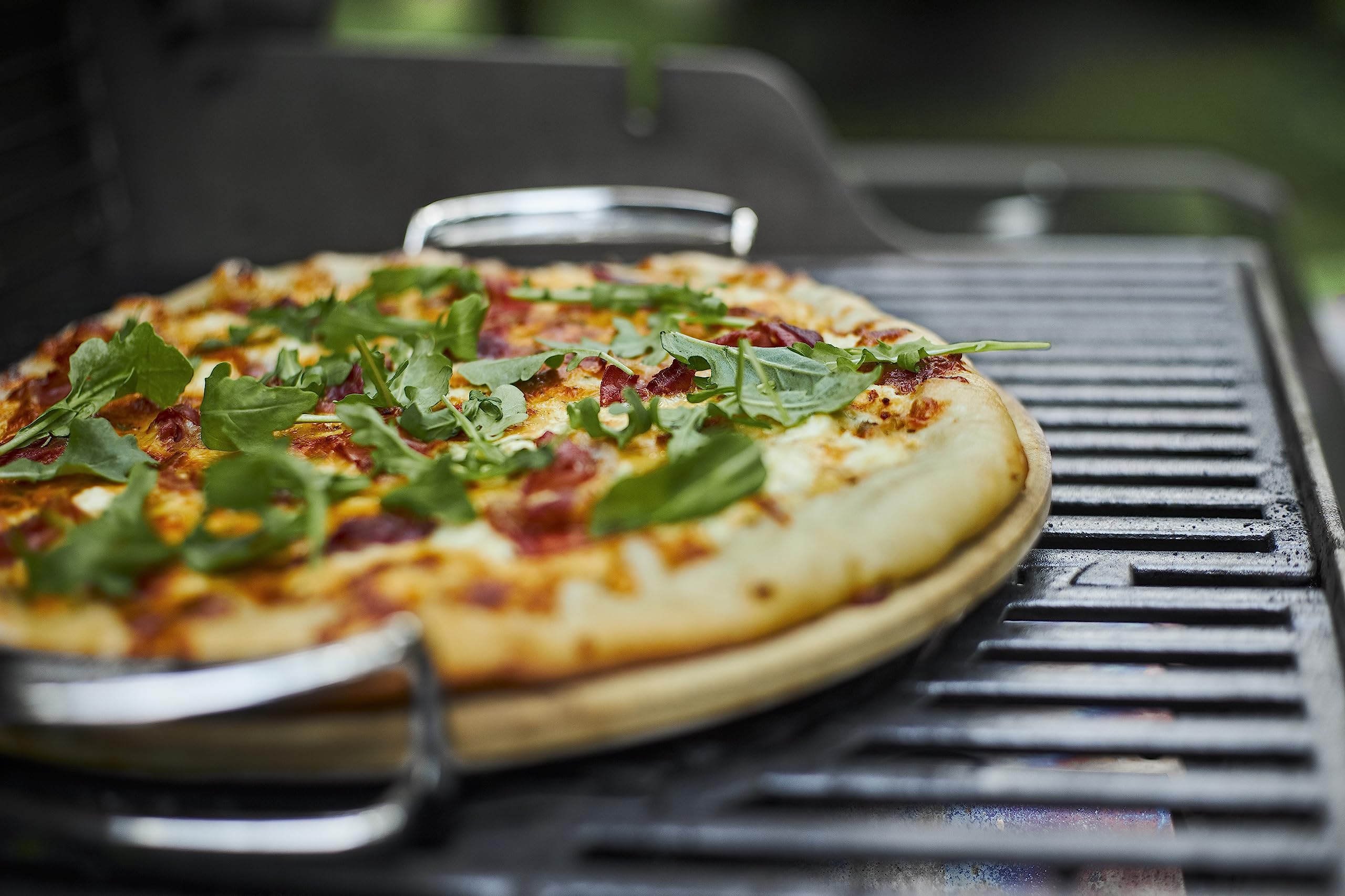 Carry rack for Weber pizza stone in use for safe transport