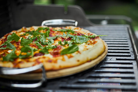 Carry rack for Weber pizza stone in use for safe transport
