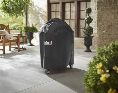 Weber cover fastening strap close-up ensures secure fit during windy days