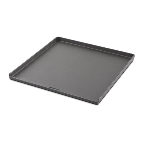 Weber Crafted flat-top griddle full surface enables versatile outdoor cooking.