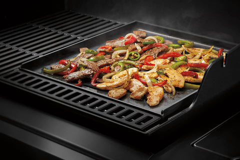 Weber Crafted pancakes-eggs-fajitas illustrates versatile flat-top cooking on outdoor grill.