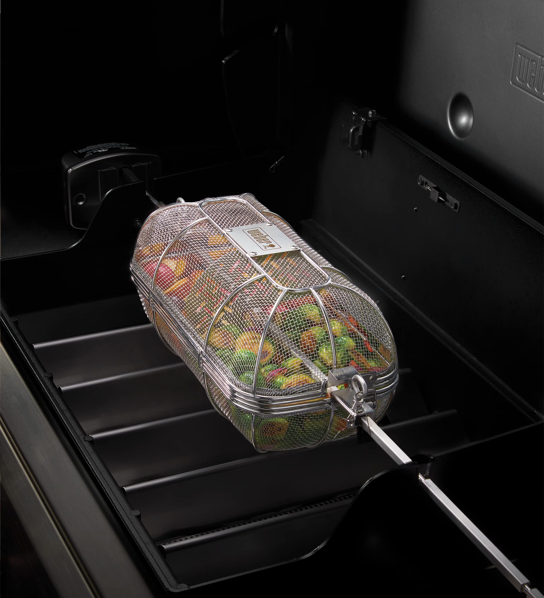 Weber Crafted Rotisserie Crisping Basket made from durable stainless steel for outdoor use