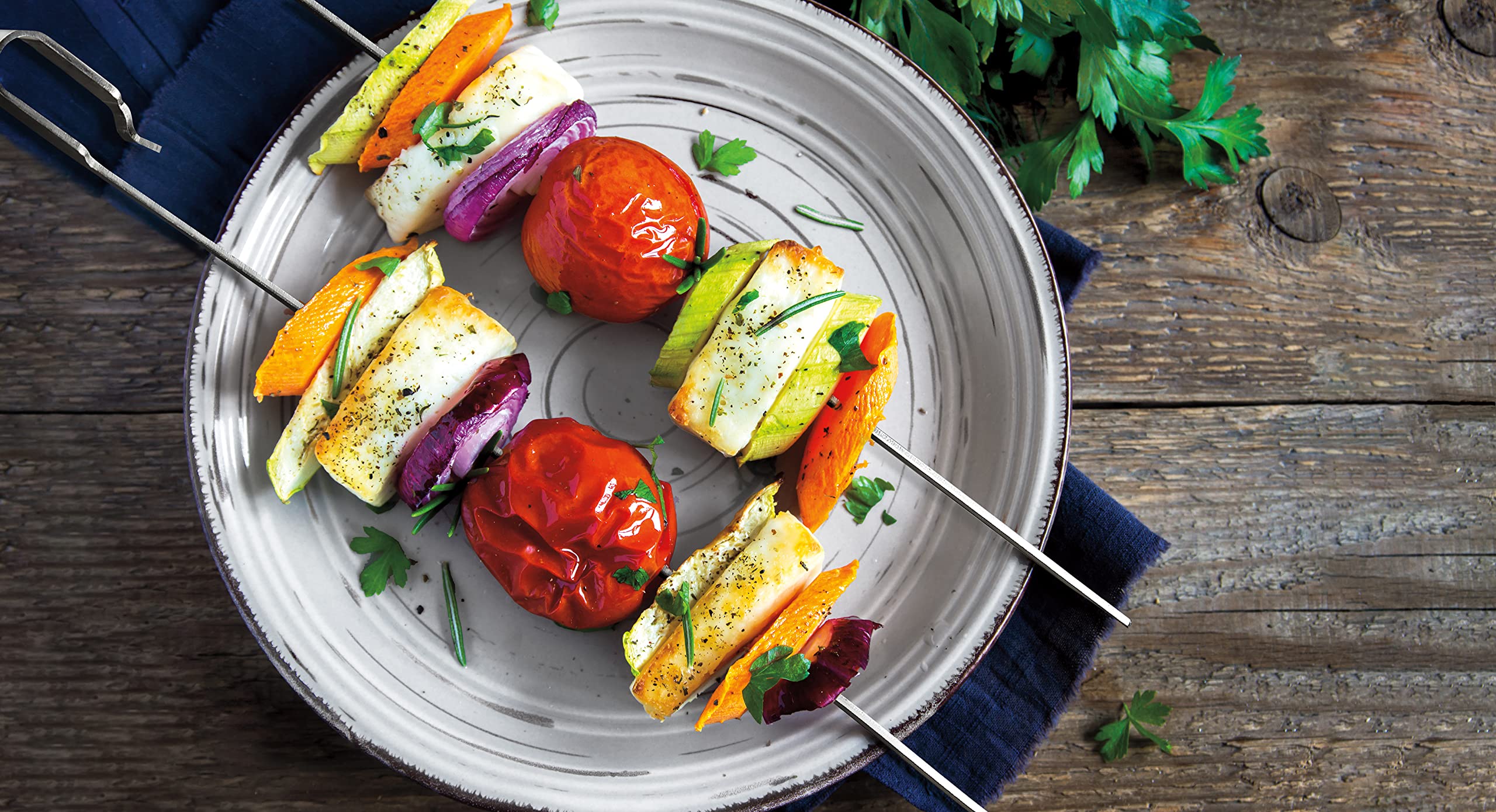 Weber Crafted Rotisserie Skewers are durable stainless steel for outdoor grilling.